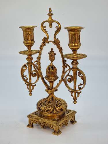 A pair of 19th century French gilt bronze candlesticks, circa 1870
