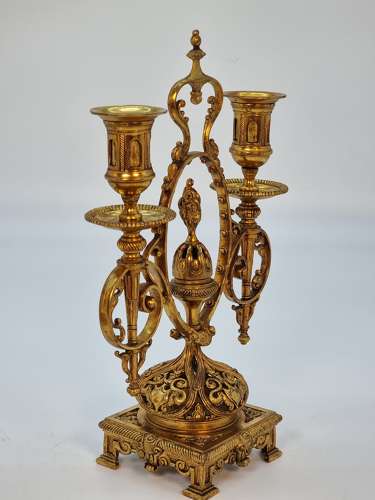 A pair of 19th century French gilt bronze candlesticks, circa 1870