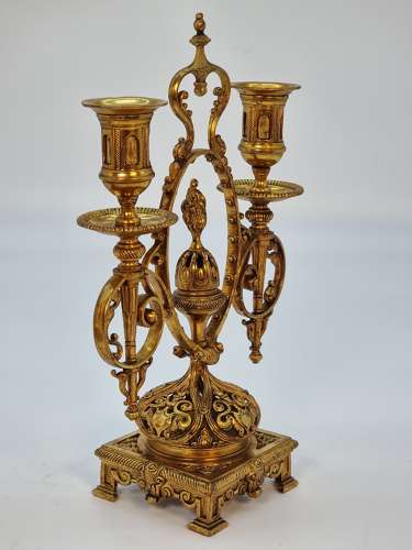 A pair of 19th century French gilt bronze candlesticks, circa 1870