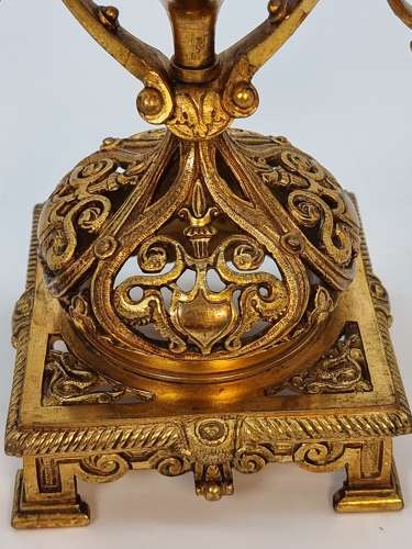 A pair of 19th century French gilt bronze candlesticks, circa 1870