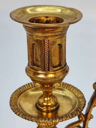 A pair of 19th century French gilt bronze candlesticks, circa 1870