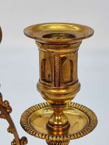 A pair of 19th century French gilt bronze candlesticks, circa 1870