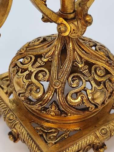 A pair of 19th century French gilt bronze candlesticks, circa 1870
