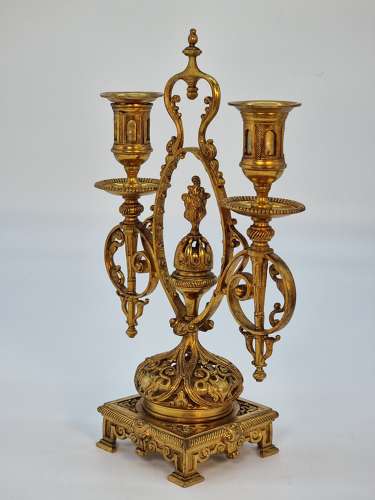 A pair of 19th century French gilt bronze candlesticks, circa 1870