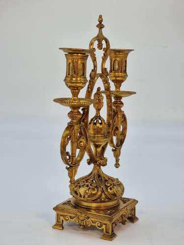 A pair of 19th century French gilt bronze candlesticks, circa 1870