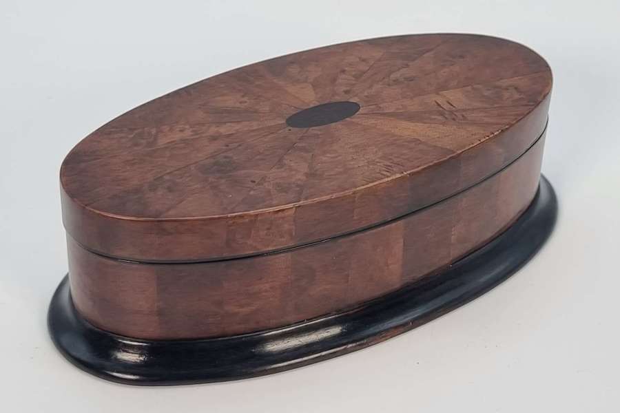 Antique oval box veneered in segments of burr walnut, circa 1910
