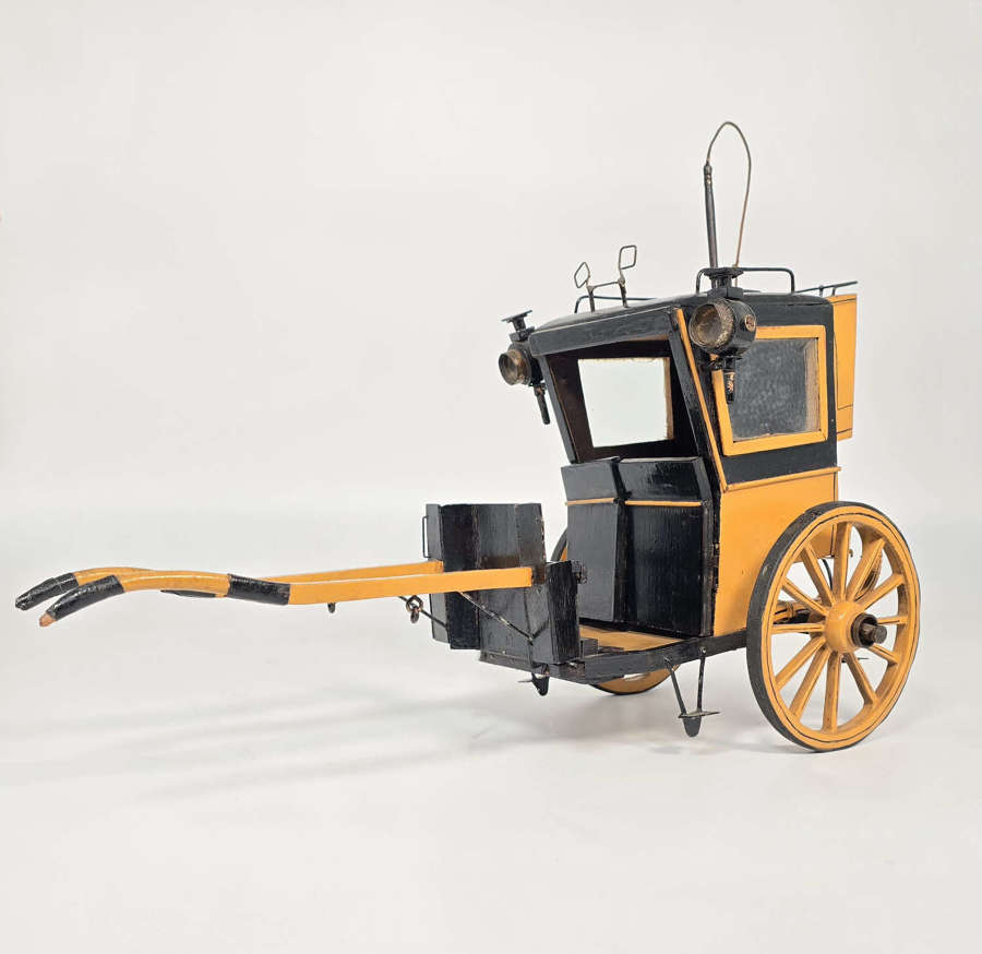 A 1920s scale model of an early 19th century Hanson cab