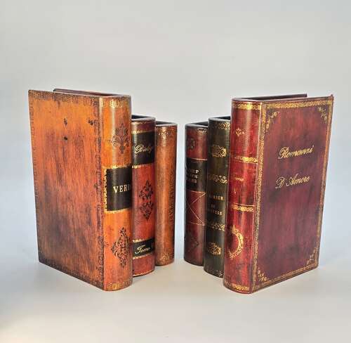 A pair of bookends made in the form of antique leather bound books.