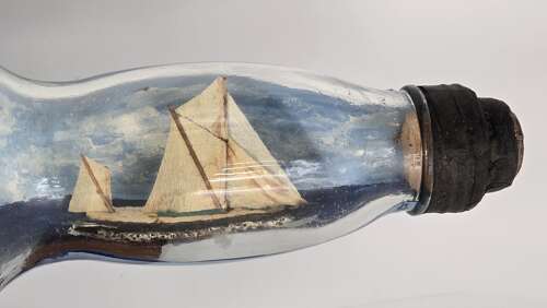 A large folk art diorama double ship in a bottle circa 1920
