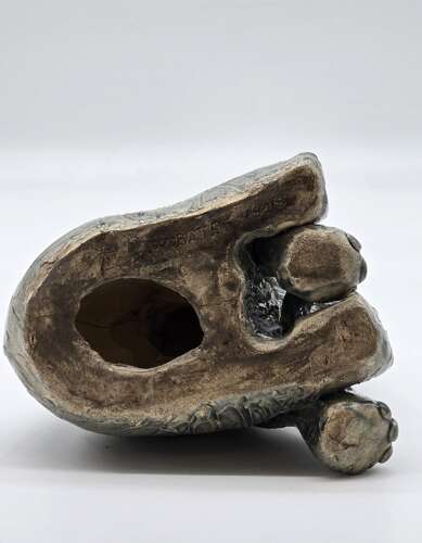 Antique glazed pottery sculpture of a baby elephant made in 1928