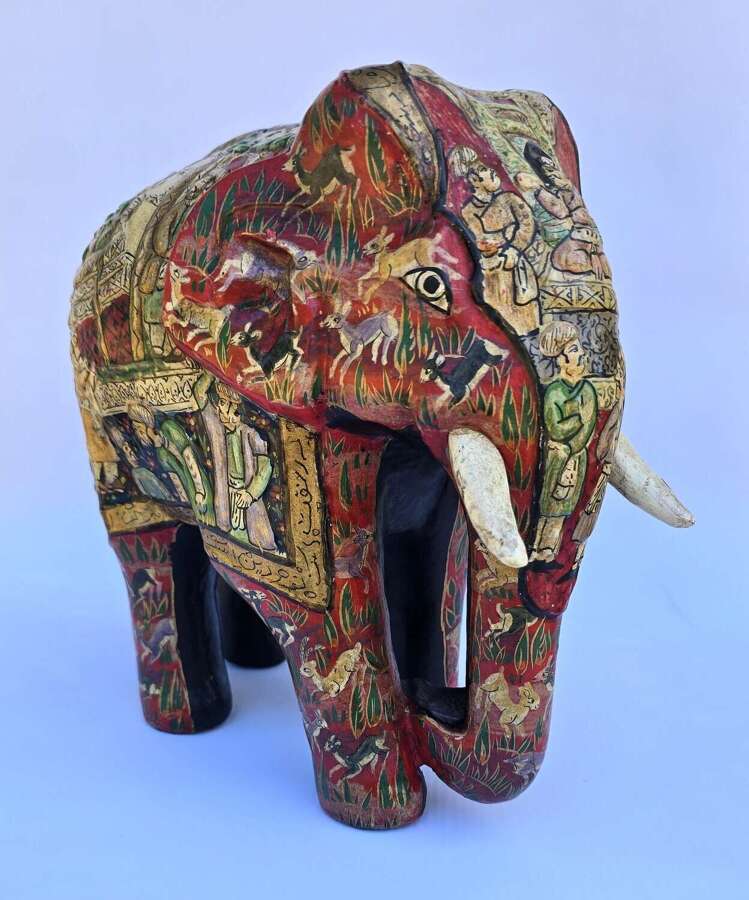 A Kashmiri Indian papier m&acirc;ch&eacute; hand painted elephant circa 1910