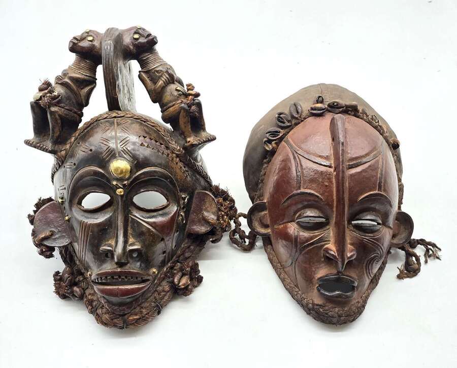 A matched pair of African tribal masks, circa 1930
