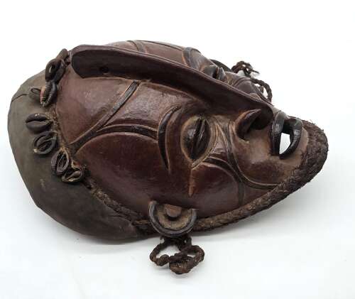 A matched pair of African tribal masks, circa 1930