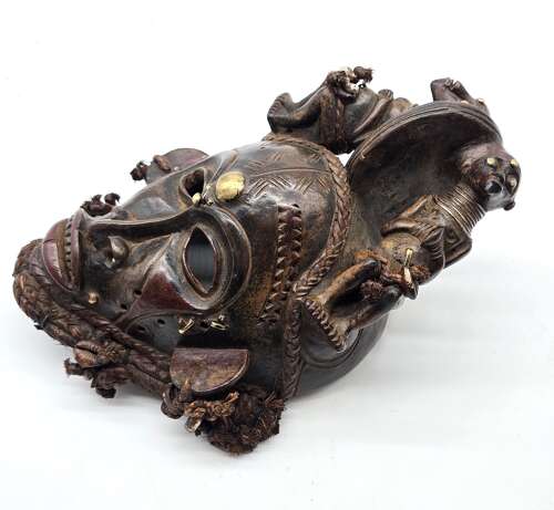 A matched pair of African tribal masks, circa 1930