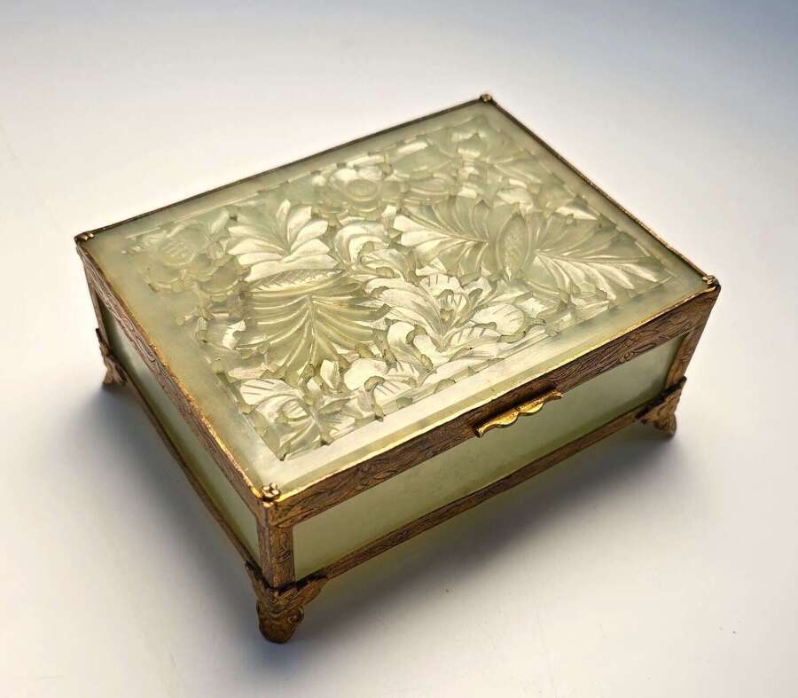 A Chinese carved jade and gilt metal mounted jewellery box circa 1920