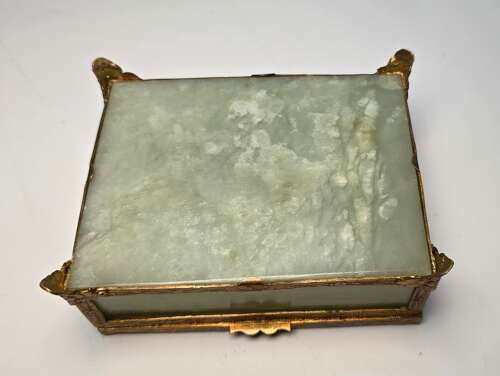 A Chinese carved jade and gilt metal mounted jewellery box circa 1920