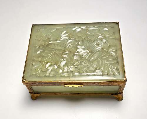 A Chinese carved jade and gilt metal mounted jewellery box circa 1920
