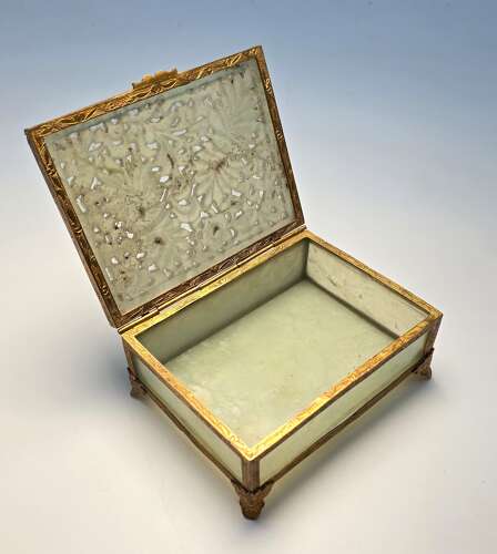 A Chinese carved jade and gilt metal mounted jewellery box circa 1920