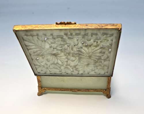 A Chinese carved jade and gilt metal mounted jewellery box circa 1920