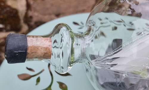 An exceptionally large hand blown glass model ship in a bottle.