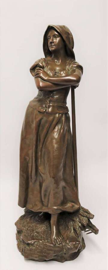 19th century bronze sculpture of a young female gathering hey, circa 1880