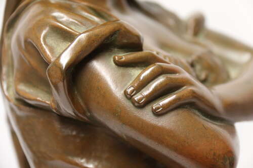 19th century bronze sculpture of a young female gathering hey, circa 1880