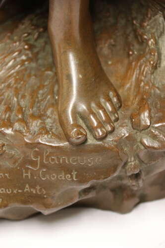 19th century bronze sculpture of a young female gathering hey, circa 1880
