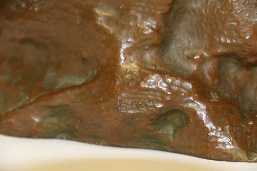 19th century bronze sculpture of a young female gathering hey, circa 1880