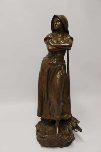 19th century bronze sculpture of a young female gathering hey, circa 1880