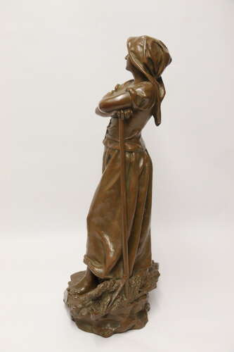 19th century bronze sculpture of a young female gathering hey, circa 1880