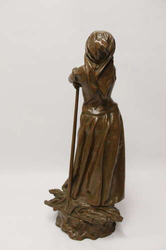 19th century bronze sculpture of a young female gathering hey, circa 1880