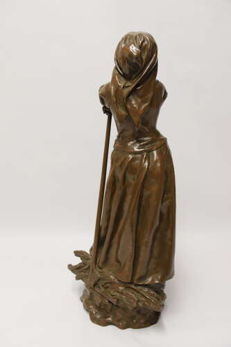 19th century bronze sculpture of a young female gathering hey, circa 1880
