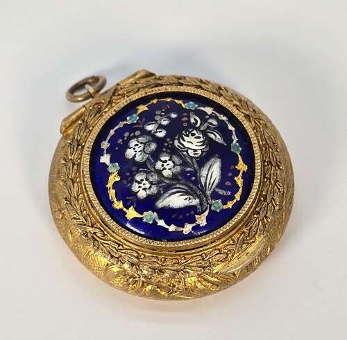 A French mid 19th century ladies gilt and enamel patch box circa 1860