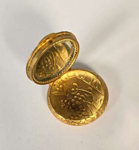 A French mid 19th century ladies gilt and enamel patch box circa 1860