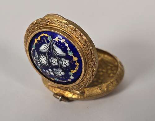 A French mid 19th century ladies gilt and enamel patch box circa 1860