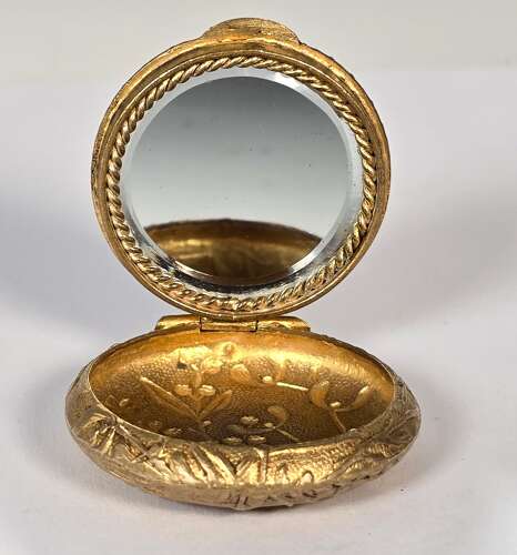 A French mid 19th century ladies gilt and enamel patch box circa 1860