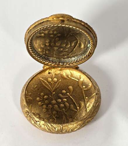 A French mid 19th century ladies gilt and enamel patch box circa 1860