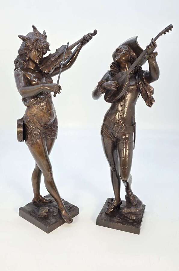 A fine pair of late 19th C bronze harlequin figures by Alfred Grevin