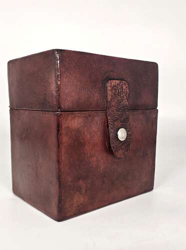 Six spirit decanter set in a leather fitted case used for hunting or shooting, circa 1920