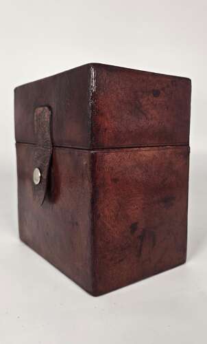 Six spirit decanter set in a leather fitted case used for hunting or shooting, circa 1920
