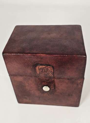 Six spirit decanter set in a leather fitted case used for hunting or shooting, circa 1920