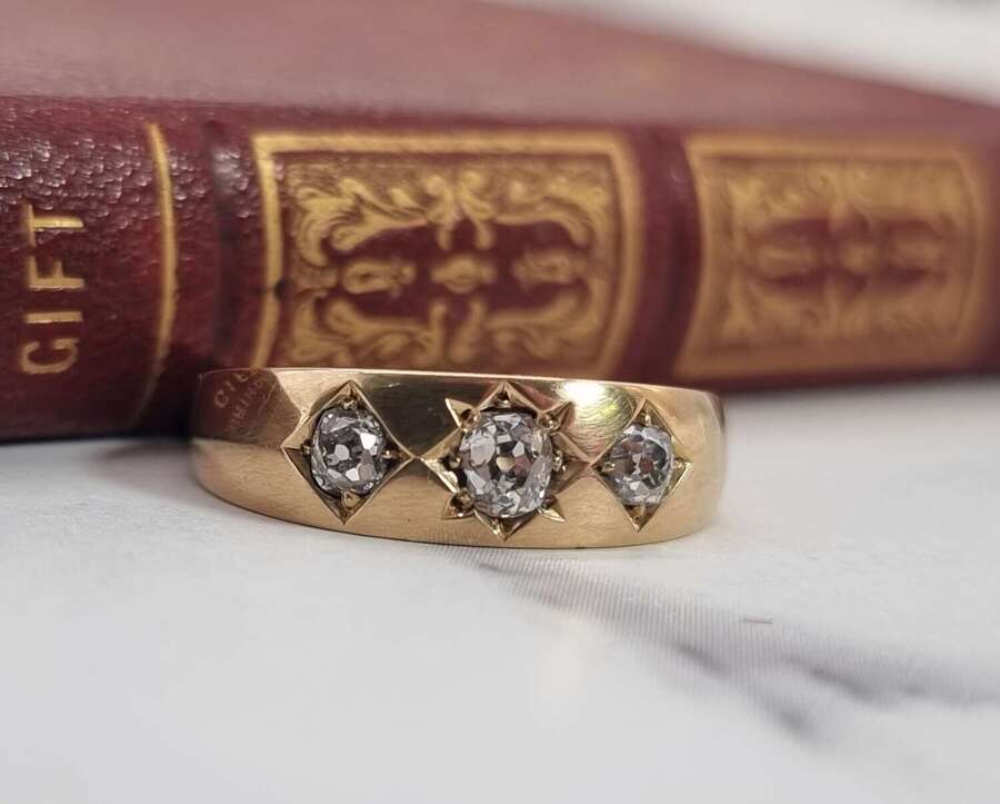 A gold and diamond three stone ring, Victorian 1870