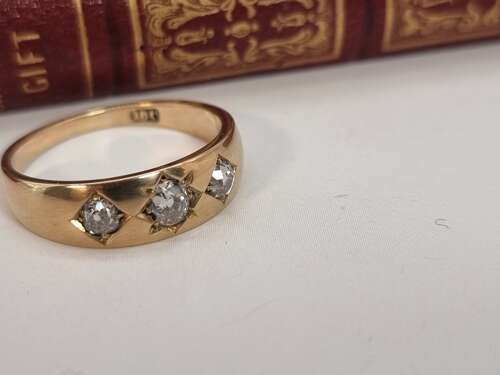 A gold and diamond three stone ring, Victorian 1870